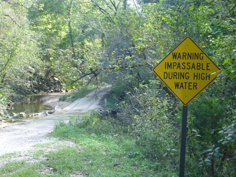 The low water bridge at the entrance/exit to Rush Campground can be impassable during heavy rain events.