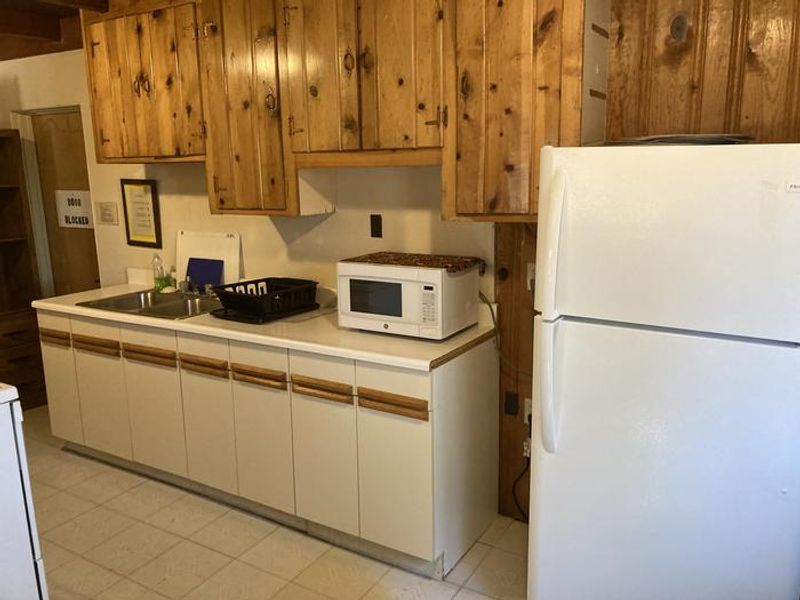 The kitchen is equipped with basic items