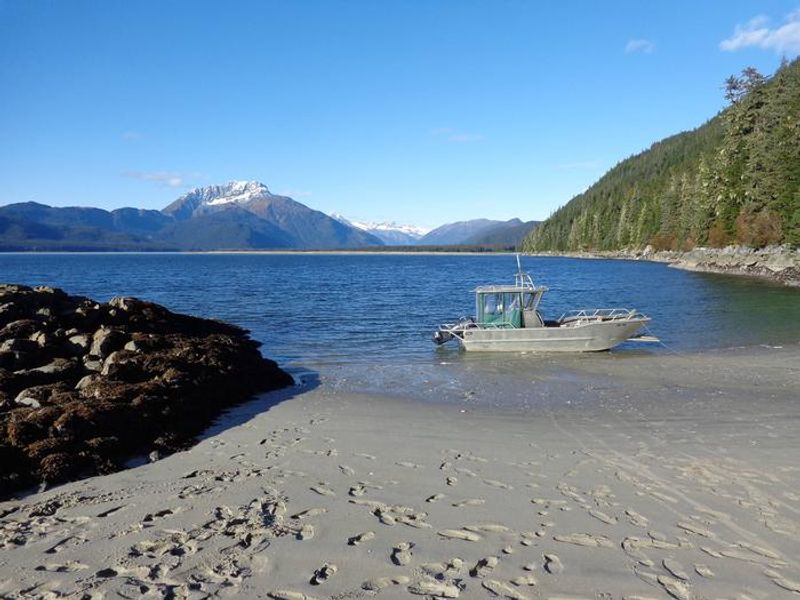 Sand beach with mooring buoy