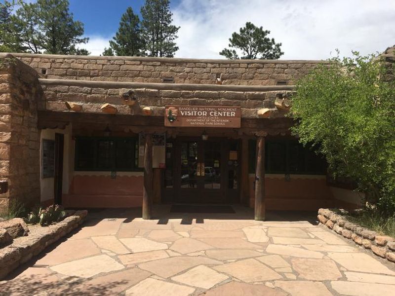 The Bandelier Visitor Center, located in Frijoles Canyon, is part of the park's historic Civilian Conservation Corps (CCC) District. The Visitor Center is open 7 days a week and is home to museum exhibits and a short film. Park rangers are available to answer questions and provide trail recommendations. Ranger programs are offered during the summer months. The CCC District is also home to the park store, operated by Western National Parks Association, and Sirphey in the Canyon, a small locally owned cafe. 