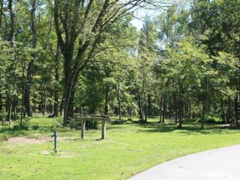 Large site with picnic table, fire ring and horse rail.  
Campground is by reservations.
