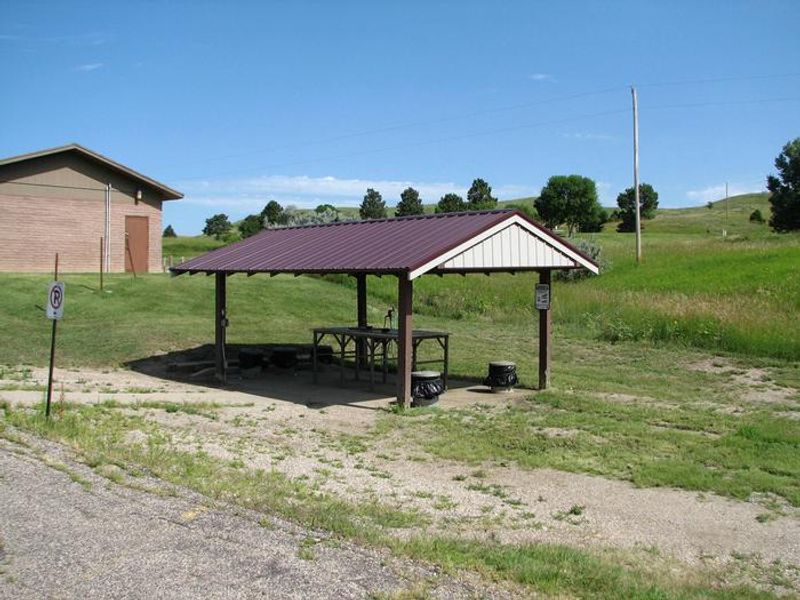 This fish cleaning station is located adjacent to the Main Boat Ramp parking lot.  During the camping season, the station has running water, electric plug-ins, overhead lights and fish cans.  During the winter months it is a Pack-It-In/ Pack-It-Out cleaning station.