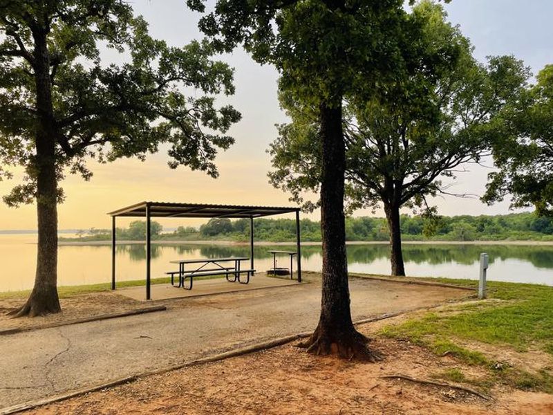 A photo of facility JOHNSON CREEK with Picnic Table, Electricity Hookup, Waterfront