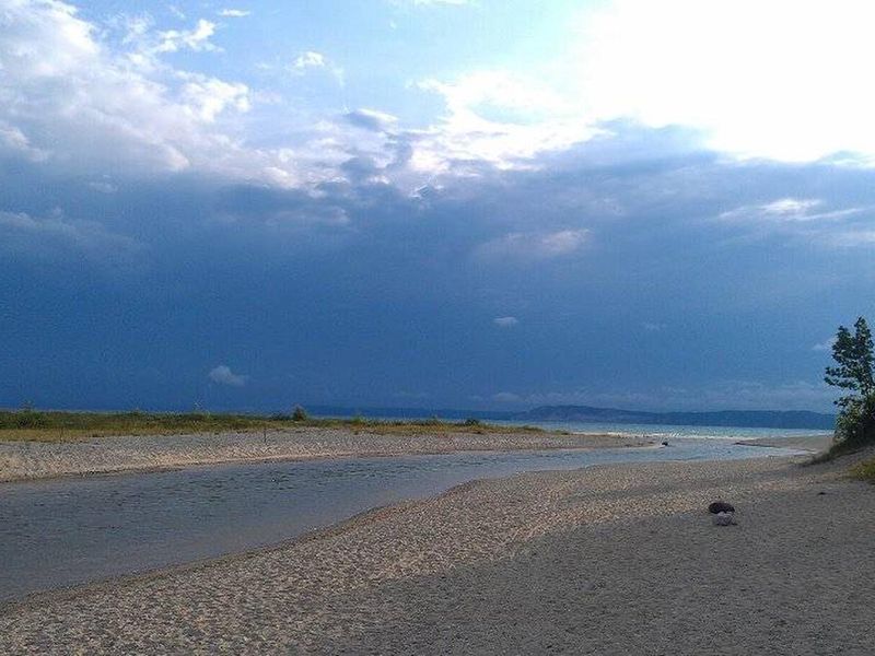 Storm clouds moving over the Platte Point Beach