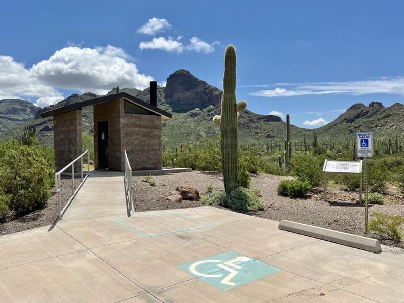 There is ADA accessible parking near the vault toilet restroom.