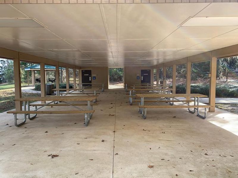 Picnic tables and male and female rest rooms