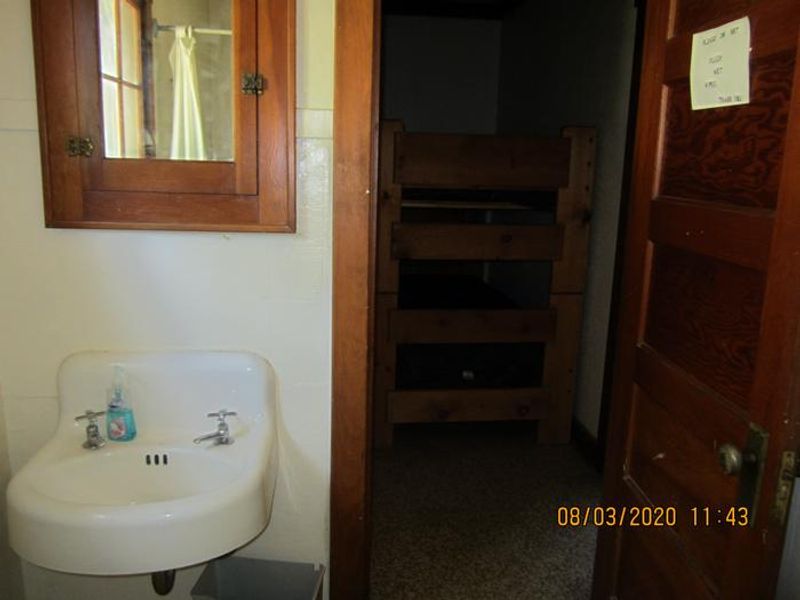 Barber Flat's restroom is conveniently close to the bunk bedroom.