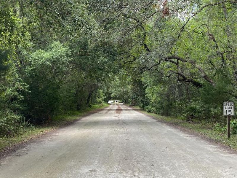 A photo of facility Lake Dorr Campground entrance with Shade