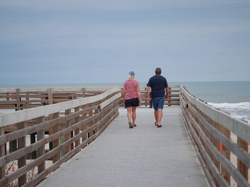 Every day is a great day to stroll the boardwalk to the beach.