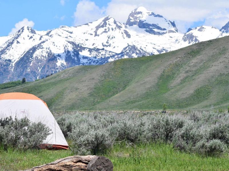 The Gros Ventre Campground is situated in a tranquil setting with incredible views of Blacktail Butte and the Grand Teton Mountain Range. Within walking distance is the Gros Ventre River, which runs through forests, cliffs, and narrow canyons. This area is known for its remarkable fly fishing and photography opportunities. 