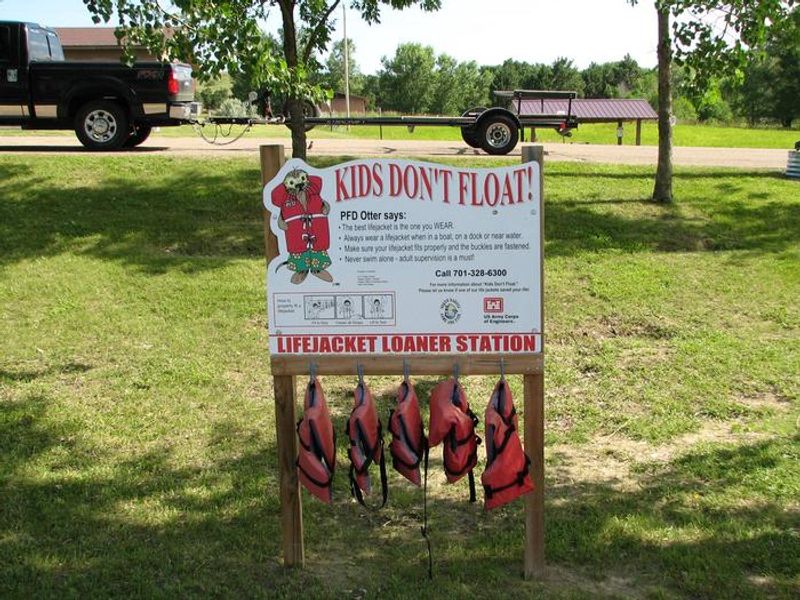There is a life jacket loaner station located near the boat ramp in the campground.  This has 5 life jackets ranging in size from infant though youth (90 lbs) for the public to use if they need an extra life jacket while out on the water. 