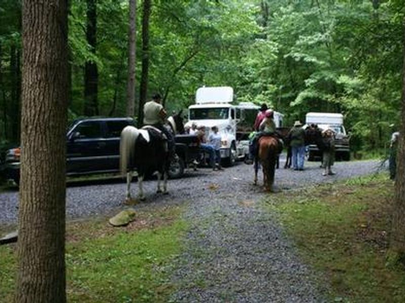 Horseback riders leaving the camp for the day