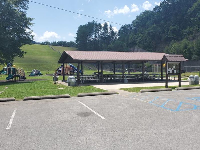All four shelters have a little something unique to offer.  Shelter 1 is close to restrooms, play areas, horseshoe pits and a large baseball field. Shelter 2 is nicely shaded with excellent fishing access. Shelter 3 is perfect for parents to keep an eye on kids as they enjoy the large playground or basketball court. Shelter 4 will get you away from the large downstream crowd, is a short walk from a grand view of the dam, while also having a small play area.
