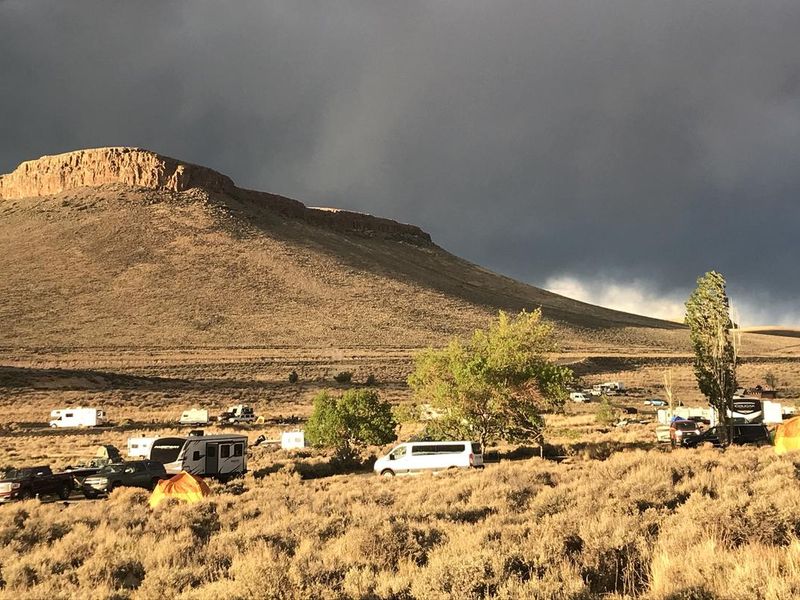 Dramatic Clouds over a Butte form the backdrop of Elk Creek Campground