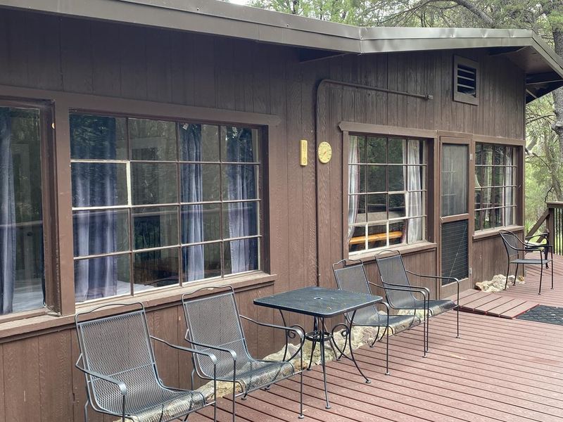 This cabin has a great deck that overlooks the intermittent creek. 