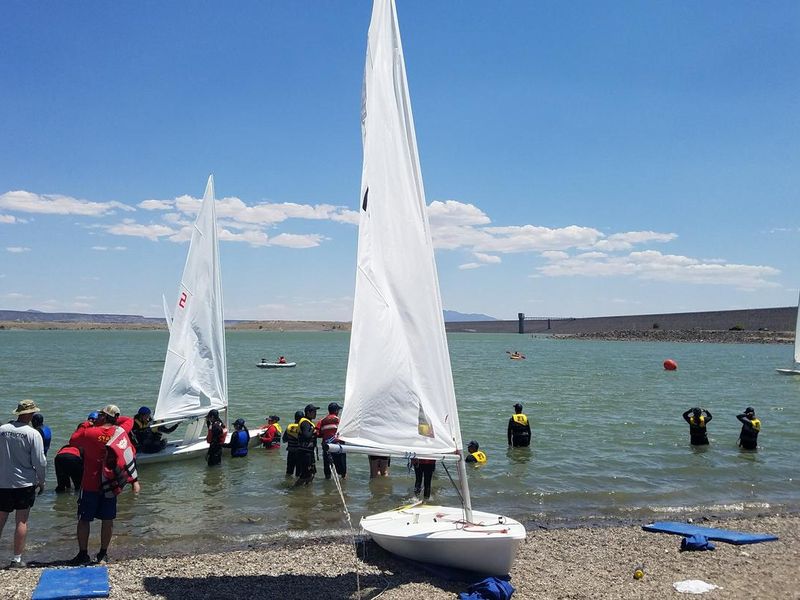 Teaching kids how to row a canoe.