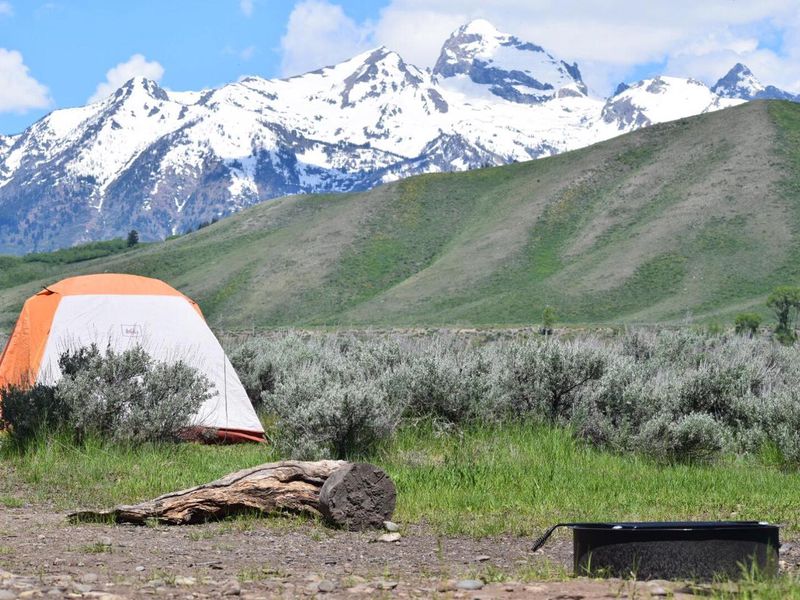The Gros Ventre Campground is situated in a tranquil setting with incredible views of Blacktail Butte and the Grand Teton Mountain Range. Within walking distance is the Gros Ventre River, which runs through forests, cliffs, and narrow canyons. This area is known for its remarkable fly fishing and photography opportunities. 