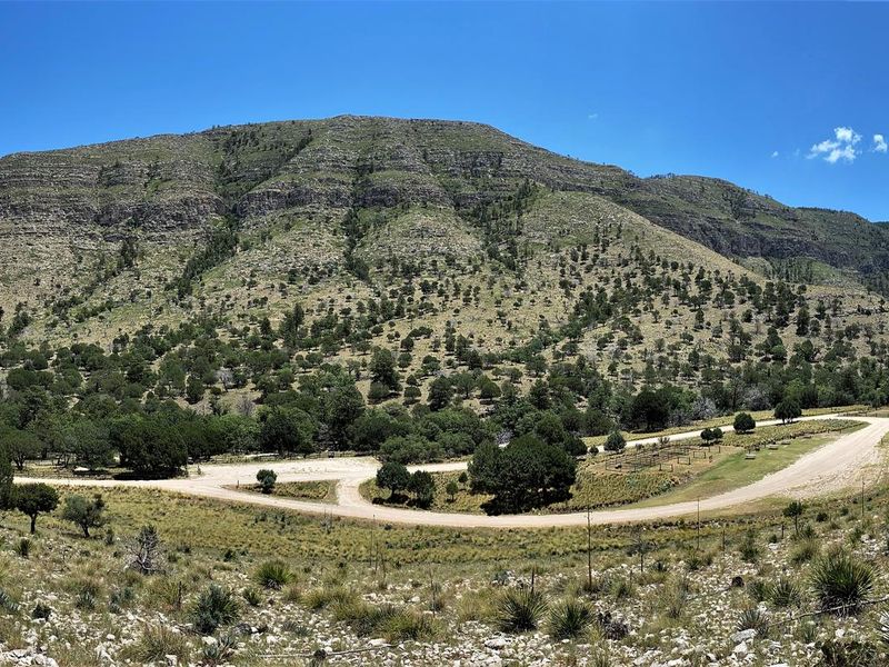 Overview of Dog Canyon campground, loop road and mountain views.
