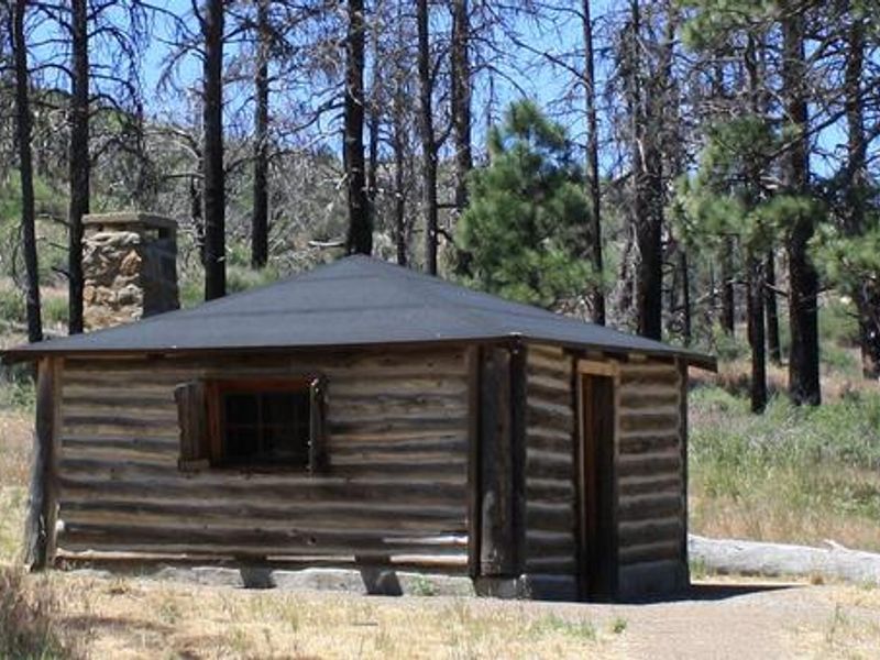 The Ranger Cabin built in 1911 still stands in El Prado Campground.
