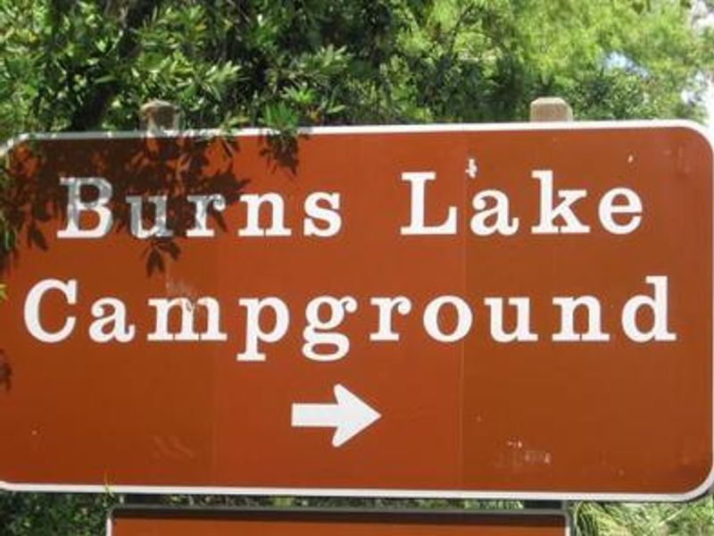 Sign for Burns Lake Campground from the highway
