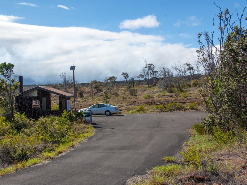 View of campground and accessible vault toilet