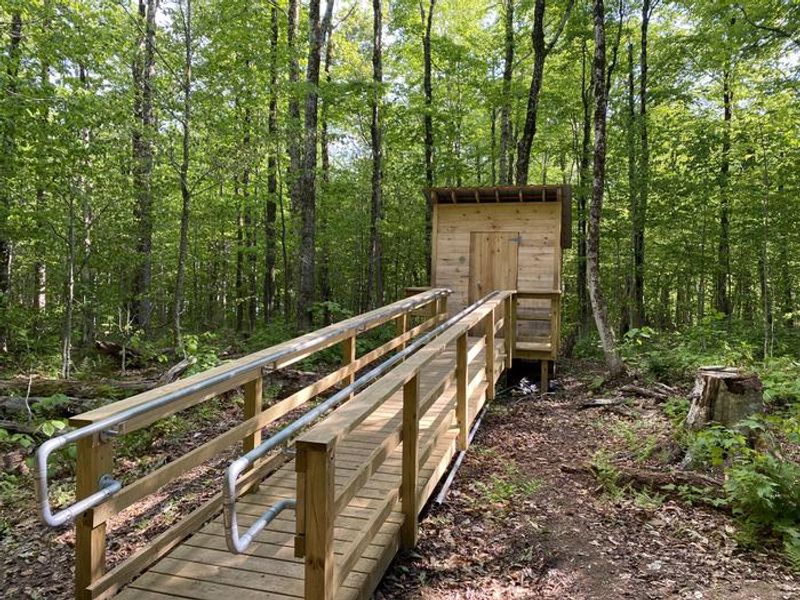 A photo of facility Grout Pond Campground with Shade
