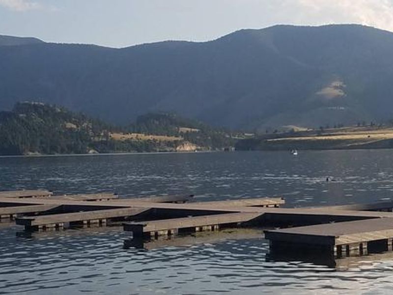 Log Gulch Campground offers amenities to make your stay enjoyable and memorable. Sleeping Giant is visible from the dock.