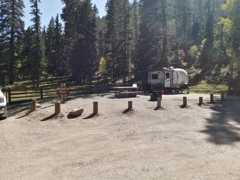 A camper in the campground parking area.